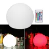 A collage showing a white LED globe light and a remote control in the top section, and the globe light in white and red colors illuminating drinks in the bottom section. Podgląd zdjęcia produktu
