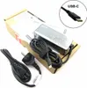 A Lenovo laptop charger and its accessories are laid out on a white surface, with the product packaging partially visible. Produktbild-Vorschau