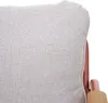 A close-up view of a beige cushion on a piece of furniture. Podgląd zdjęcia produktu