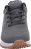 A close-up front view of a gray Skechers sneaker. Voir les images du produit