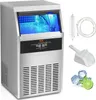 A commercial ice maker with ice inside, along with accessories like a water filter, ice scoop, and lime slices. Produktbild-Vorschau