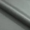A close-up of gray fabric, folded to show texture and drape. Podgląd zdjęcia produktu