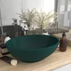 A dark green ceramic washbasin is placed on a wooden countertop in a bathroom setting. Náhled obrázku produktu