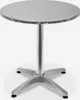 A silver round table with a cross-shaped base, photographed against a white background. Voir les images du produit