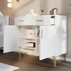A white sideboard with gold legs is shown with its doors open, revealing shelves and items inside. Anteprima dell’immagine prodotto
