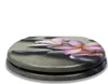 A toilet seat with a printed design of spa stones and pink flowers. Produktbild-Vorschau