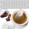 A collage showing tea bags, dried rose buds, and a cup of tea. Anteprima dell’immagine prodotto