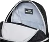 Close-up view of the inside of an open backpack, showing the lining and a label. Náhled obrázku produktu