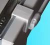 Close-up of a white plastic bracket holding a gray rod, attached to a white track. Produktbild-Vorschau