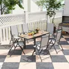 An outdoor patio set with a table and chairs, set up for a meal. Produktbild-Vorschau
