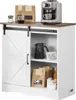 A coffee bar cabinet with a sliding barn door, displaying various coffee-related items on its top and shelves. Produktbild-Vorschau