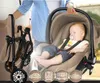 A baby sleeping in a car seat attached to a stroller, with icons indicating travel options. Produktbild-Vorschau