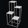 A white tiered stand with a black background. Anteprima dell’immagine prodotto