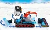 A toy snow groomer with detachable parts, set against a snowy mountain backdrop. Podgląd zdjęcia produktu