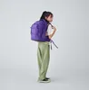 A young person wearing a backpack. Náhľad obrázku produktu