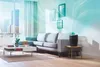 A modern living room with a sofa, coffee table, and an air purifier emitting a visible flow of air. Produktbild-Vorschau