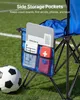 A close-up of the side storage pockets of a blue camping chair on a grassy field, with a soccer ball nearby. Náhled obrázku produktu