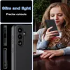 A young woman is holding a smartphone with a black case while sitting at a table with drinks. Produktbild-Vorschau