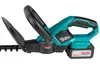 A close-up side view of a teal and black cordless hedge trimmer with a battery pack attached. Produktbild-Vorschau