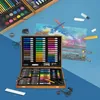An open art supply case with various art supplies laid out, including markers, colored pencils, watercolors, and pastels. A partially completed drawing is also visible. Náhled obrázku produktu