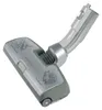 A vacuum cleaner floor head attachment with a curved handle. Anteprima dell’immagine prodotto