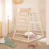 A wooden indoor play structure for children, set up in a room with soft furnishings and natural light. Anteprima dell’immagine prodotto