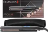 A Remington PROluxe Midnight Edition hair straightener and its storage pouch are displayed against a dark, patterned background. Náhľad obrázku produktu