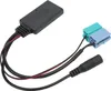 A close-up shot of a car audio adapter with multiple connectors. Podgląd zdjęcia produktu