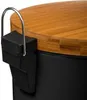 A close-up view of the top corner of a black trash can with a bamboo lid and a metal handle. Náhľad obrázku produktu