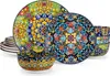 A set of colorful, patterned ceramic plates and bowls are arranged on a white background. Produktbild-Vorschau