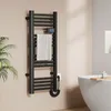 A black electric towel radiator with a white towel hanging on it, mounted on a beige wall next to a white bathtub. Anteprima dell’immagine prodotto