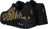A pair of black SKECHERS UNO women's sports shoes with gold detailing, shown from a side-rear angle. Voir les images du produit