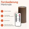 A close-up of a brown LED candle with a remote control, highlighting its features. Anteprima dell’immagine prodotto