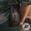 A person wearing jeans and a plaid shirt is shown with a black phone case attached to their belt. Náhled obrázku produktu