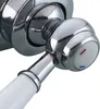 A close-up view of a faucet handle with red and blue indicators. Produktbild-Vorschau