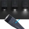 Three flashlights are shown in the background, with one flashlight in the foreground, highlighting a button. Anteprima dell’immagine prodotto