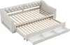 A beige upholstered daybed with a pull-out trundle and three drawers is shown from a slightly elevated, angled perspective. Voir les images du produit