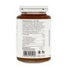 A close-up view of the back label of a glass jar containing a brown liquid, likely a food product. Voir les images du produit