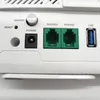 A close-up view of the back panel of a Zyxel router, showing various ports and buttons. Podgląd zdjęcia produktu