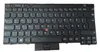 A black keyboard with a red trackpoint in the center. Produktbild-Vorschau