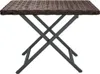 A brown wicker-patterned folding table with gray metal legs, shown from a side angle against a white background. Náhľad obrázku produktu