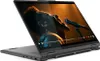 A laptop is open and displaying a video of a person singing into a microphone. Produktbild-Vorschau