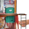 A close-up view of a toy playset, featuring a portable toilet and a ladder, with a hand interacting with the ladder. Produktbild-Vorschau