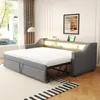 A grey sofa bed is shown in a well-lit room with a large window and curtains. Produktbild-Vorschau