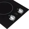 A close-up view of a black glass ceramic cooktop with two silver control knobs. Produktbild-Vorschau