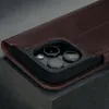 Close-up of a dark brown leather wallet case for an iPhone, showing the camera module. Anteprima dell’immagine prodotto
