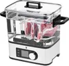 A sous vide cooker with meat in vacuum-sealed bags submerged in water. Produktbild-Vorschau