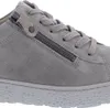 Close-up of a grey suede sneaker with laces and a zipper. Produktbild-Vorschau