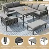 A grey outdoor furniture set on a patio with a patterned rug. Produktbild-Vorschau