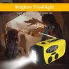 Two children are playing with a flashlight and making shadow puppets in a tent-like structure. Produktbild-Vorschau